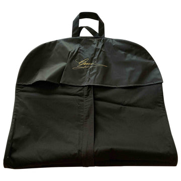 Gucci brown cloth travel bag