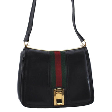 Vintage, RARE, Gucci, mod, black leather, saddle bag shoulder purse with a wide red & green center stripe, and bold gold accents g