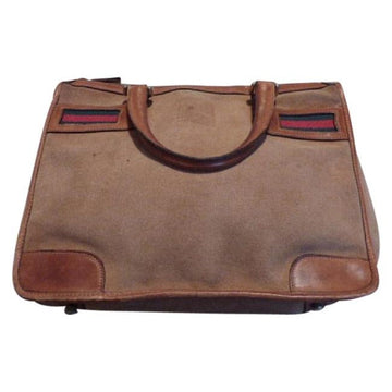 Gucci camel suede satchel with inlaid red/green striped accents!