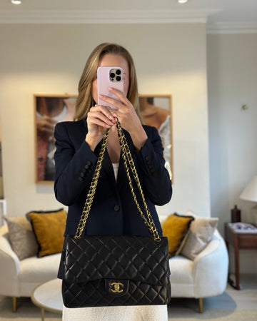 Chanel Black Jumbo Classic Double Flap Bag in Leather Leather with Gold Hardware