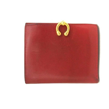 Gucci, red leather, bi-fold style, wallet with multiple pockets, tons of card slots, & a gold, engraved 'GUCCI' horseshoe accent