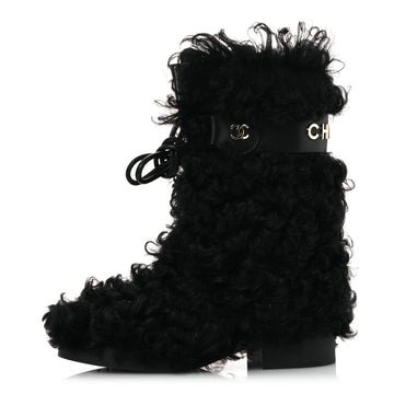 CHANEL INTERLOCKING CC LOGO SHEARLING BOOTS