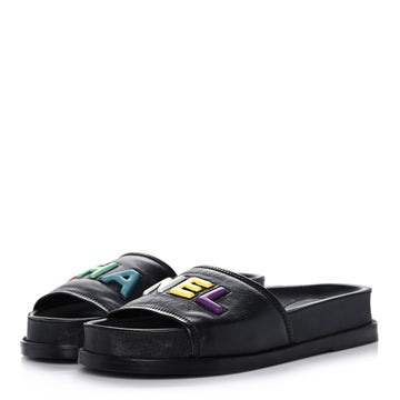 CHANEL LAMBSKIN CHA-NEL SANDLAS MULES