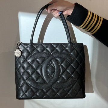 Chanel black quilted Leather leather medallion tote bag