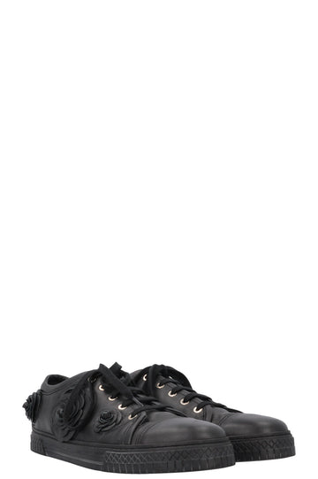 CHANEL Camelia Applique Low Top Sneaker Black