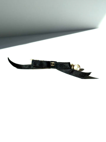 CHANEL Black Faux Pearl Bow CC Logo 2025 Gold hardware Hair Barrette Clip
