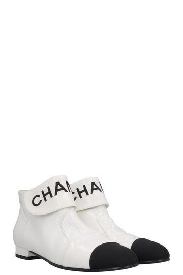 CHANEL Logo Patent Leather Ankle Boots White