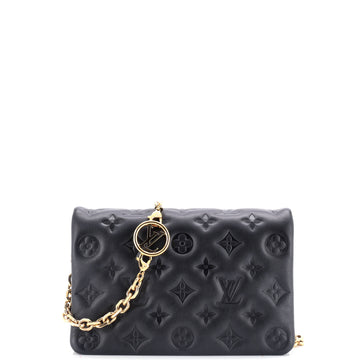 Coussin Pochette Monogram Embossed Leather