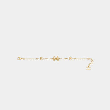 Bracelet in Gold Metal with Glass Pearls