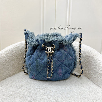 Chanel 22P Denim Mood Mini Drawstring Bucket Bag in Blue Printed Denim and LGHW