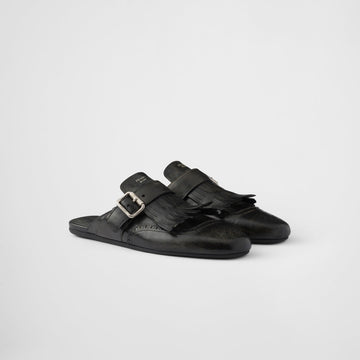 Shuffle fringed leather mules
